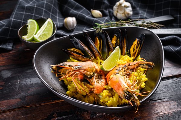 Can You Prepare an Authentic Spanish Paella with Seafood and Saffron?